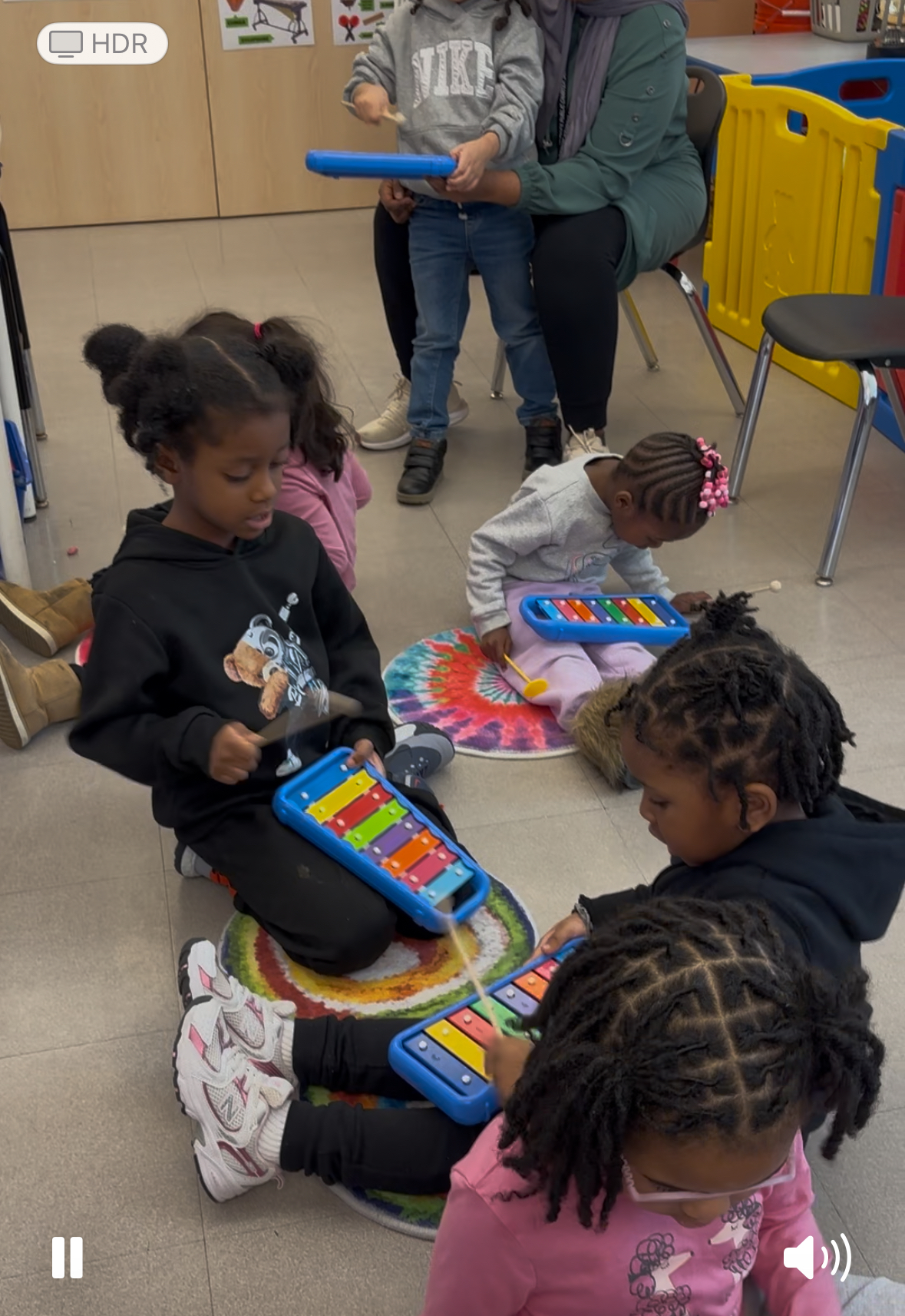 Children playing xylophones